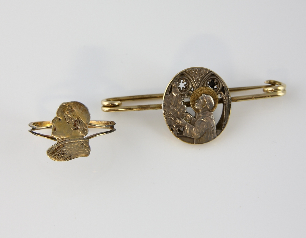 Oval cathedral scene bar brooch, central pierced panel depicts angel visiting priest, mounted in