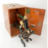 Early 20th century microscope, by Watson & Son Ltd, London, 'The Service' no. 63616, in fitted case,
