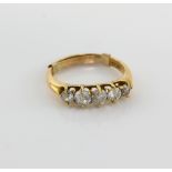 Victorian five stone diamond ring, set with four old cut diamonds and one round brilliant cut