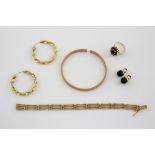 A mixed group of gold items, gate bracelet, measuring approximately 18.5cm, in yellow metal