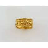 Chinese ring, with sea life decoration, including lobster, crabs and fish, mounted in yellow metal