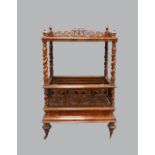 19th century walnut Canterbury with raised galleried back on spiral turned supports, the base with a