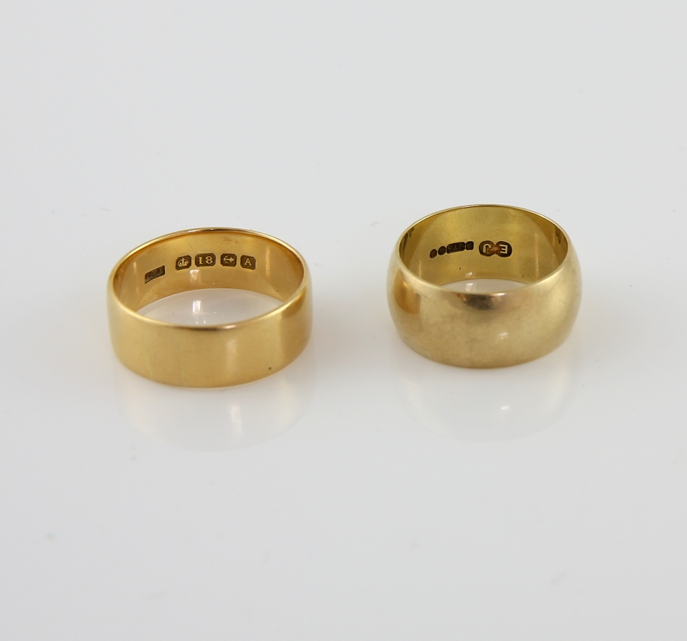 Two rings, 1920's wedding band, in 18 ct, hallmarked Birmingham 1925, size V and plain ring in 9 ct,