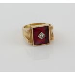 Gentleman's signet ring, centrally set with white paste stone, on rectangular red glass panel,
