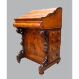 19th century walnut serpentine davenport, hinge top with fitted interior above four drawers, 90cm