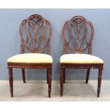 Set of six 19th Century mahogany dining chairs with carved pierced backs, and padded seats on turned