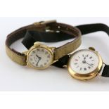 1940's lady's gold wristwatch, white enamel dial with Roman numerals, mechanical movement, in 15