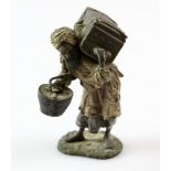 Early 20th century cold painted bronze Arab with suitcase, Austrian, stamped Geschutzt 9cm high .