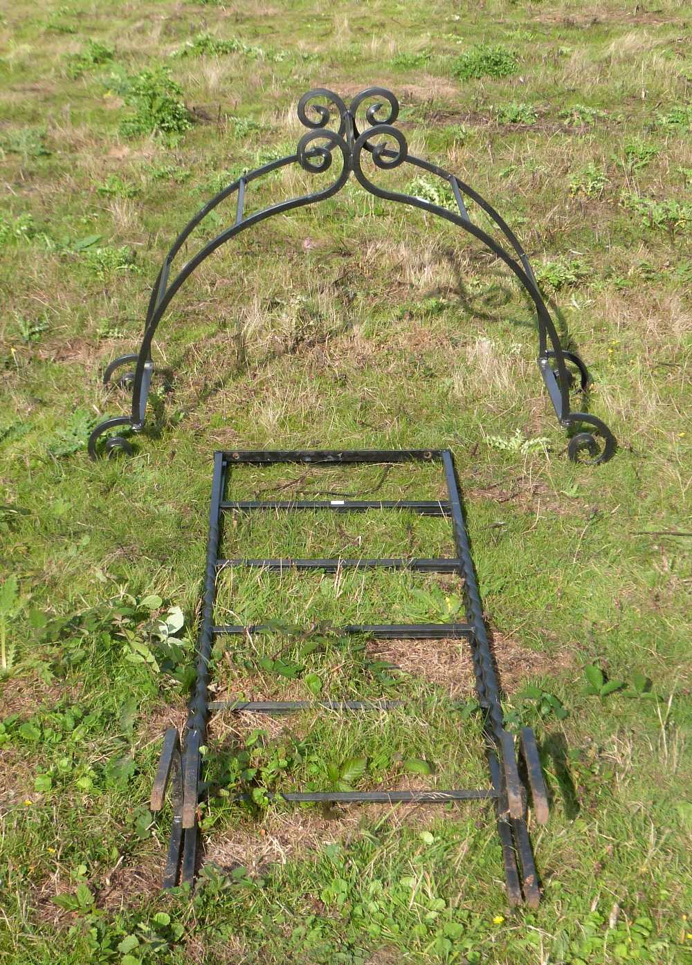 Pair of modern wrought iron garden arches, 265cm high,