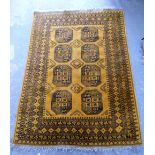 Yellow ground Afghan type rug with multiple borders, the centre with eight medallions, 224cm x 156cm