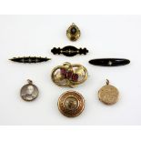 Three Victorian black enamel and pearl set brooches, a Mizpah engraved locket and other antique