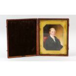 19th portrait miniature of a gentleman in a black jacket, on ivory, in leather presentation case, 16