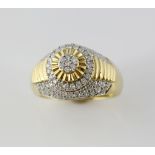 Diamond bombe ring, round brilliant cut diamonds set in rows and a central cluster, mounted in 9