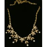 Victorian pearl fringe necklace, white round seed pearls set in flower and foliage motif, with