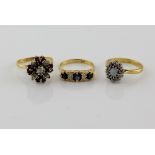 Three gold rings, ruby and diamond cluster ring, size O, with a sapphire and diamond ring with