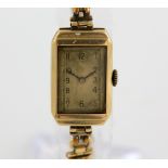 1930's ladies gold Rolex, rectangular dial with Arabic numerals, 15 Rubies Rolex signed movement, in