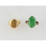 Oval gold signet ring, in 18 ct, size G and a jade ring, oval cabochon cut stone measuring 16 x