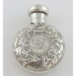 Victorian silver scent bottle and cover of lobed form with engraved foliate decoration, maker's mark