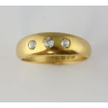 1920's old cut diamond three stone ring, estimated total weight 0.25 carats, mounted in 18 ct yellow