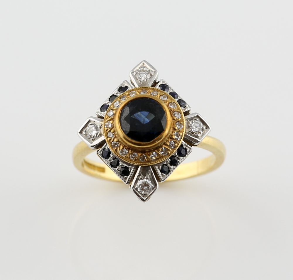 Sapphire and diamond dress ring, central round cut sapphire, estimated weight 1.00 carat, set within