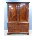 19th century mahogany linen press with two cupboard doors fitted with slides above base with two