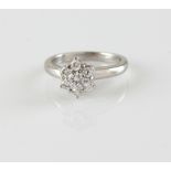 Diamond cluster ring, seven round brilliant cut diamonds, estimated total diamond weight 0.70