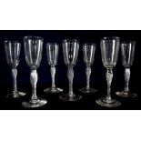 Set of seven early 20th century champagne flutes, with air-twist stems, 17 cm high.