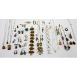 Collection of silver and costume jewellery, treated amber earring and pendant set in white metal