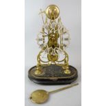 19th century brass skeleton clock with silvered dial, 40cm high