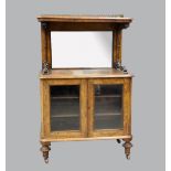 19th Century walnut boxwood and ebony strung cabinet with raised top and mirrored back above two
