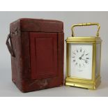 Brass and glass carriage clock by Japy Freres of Paris in leather carry case 19 cm