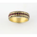 Ruby and diamond full eternity ring, set with rectangular cut rubies set in between two bands of
