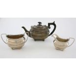 Late 19th/early 20th century silver three piece tea service, comprising teapot, cream jug and