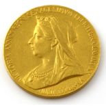 Victoria diamond jubilee 1897 medal, in yellow metal testing as 22 ct. 12.8 grams