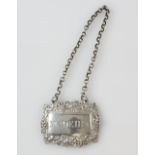 Victorian silver decanter label for Madeira, with grape and leaf border, by Yapp and Woodward,