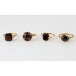 Octagonal step cut garnet single stone ring, estimated weight 5.64 carats, mounted in yellow gold