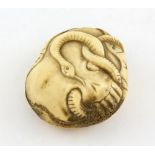 AMENDED DESCRIPTION Japanese carved bone netsuke of a snake entwined inside a skull, 5cm,