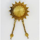 Fine gold fibula, brooch for gathering a robe, Byzantine period in the form of a shield bos,