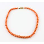 Graduated coral bead necklace, round bead 6mm to 8mm in diameter, strung without knots, measuring