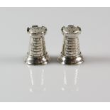 Edward VII pair of silver pepper pots in the form of castle turrets/keeps, by Henry Wilkinson &