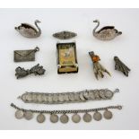 Collection of silver items, graduated curb link bracelet set with nine coins, with three marcasite