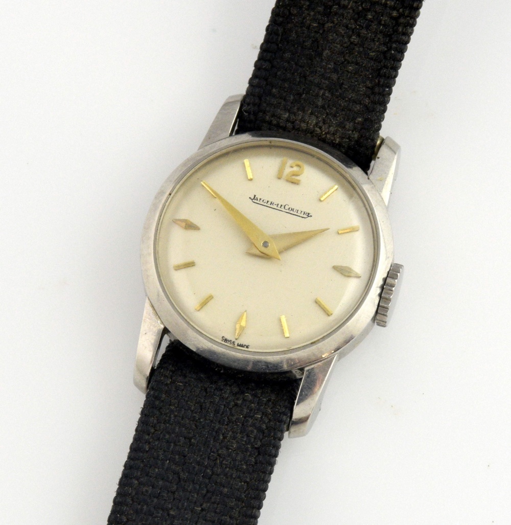 A Jaeger Le Coultre lady's wrist watch, the stainless steel case enclosing circular white enamel