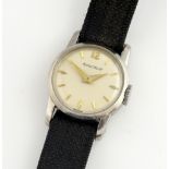 A Jaeger Le Coultre lady's wrist watch, the stainless steel case enclosing circular white enamel