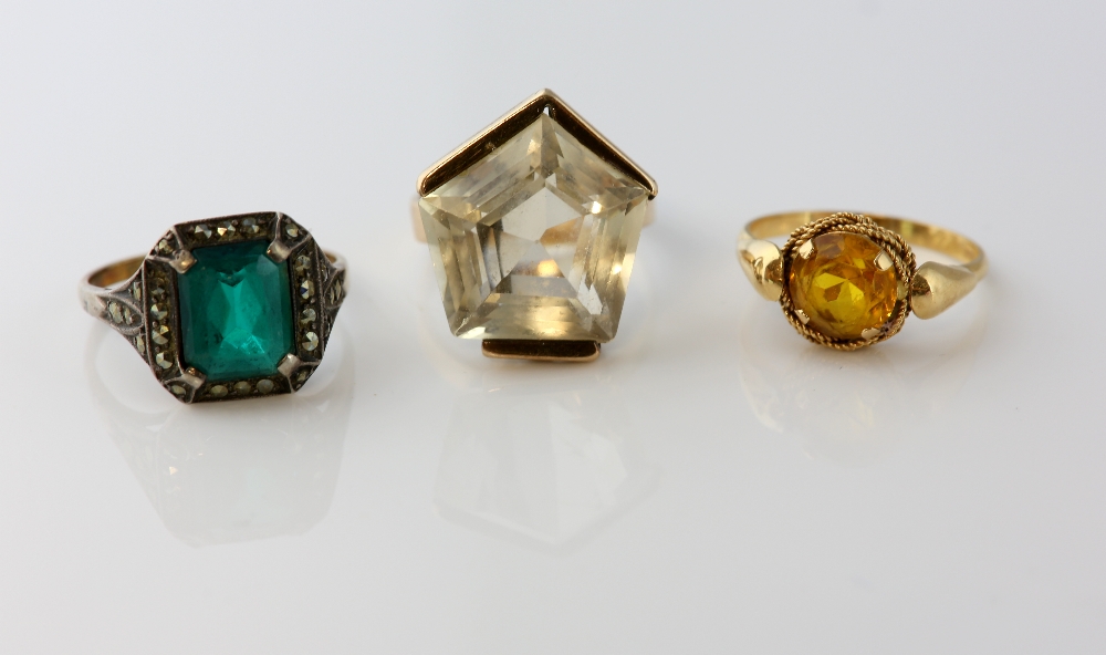Yellow paste dress ring, in yellow metal stamped 18 ct size N, with five sided step cut rock crystal