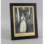 Photographic signed portrait of H.M Queen Elizabeth II and Prince Phillip, ( The Queens signature