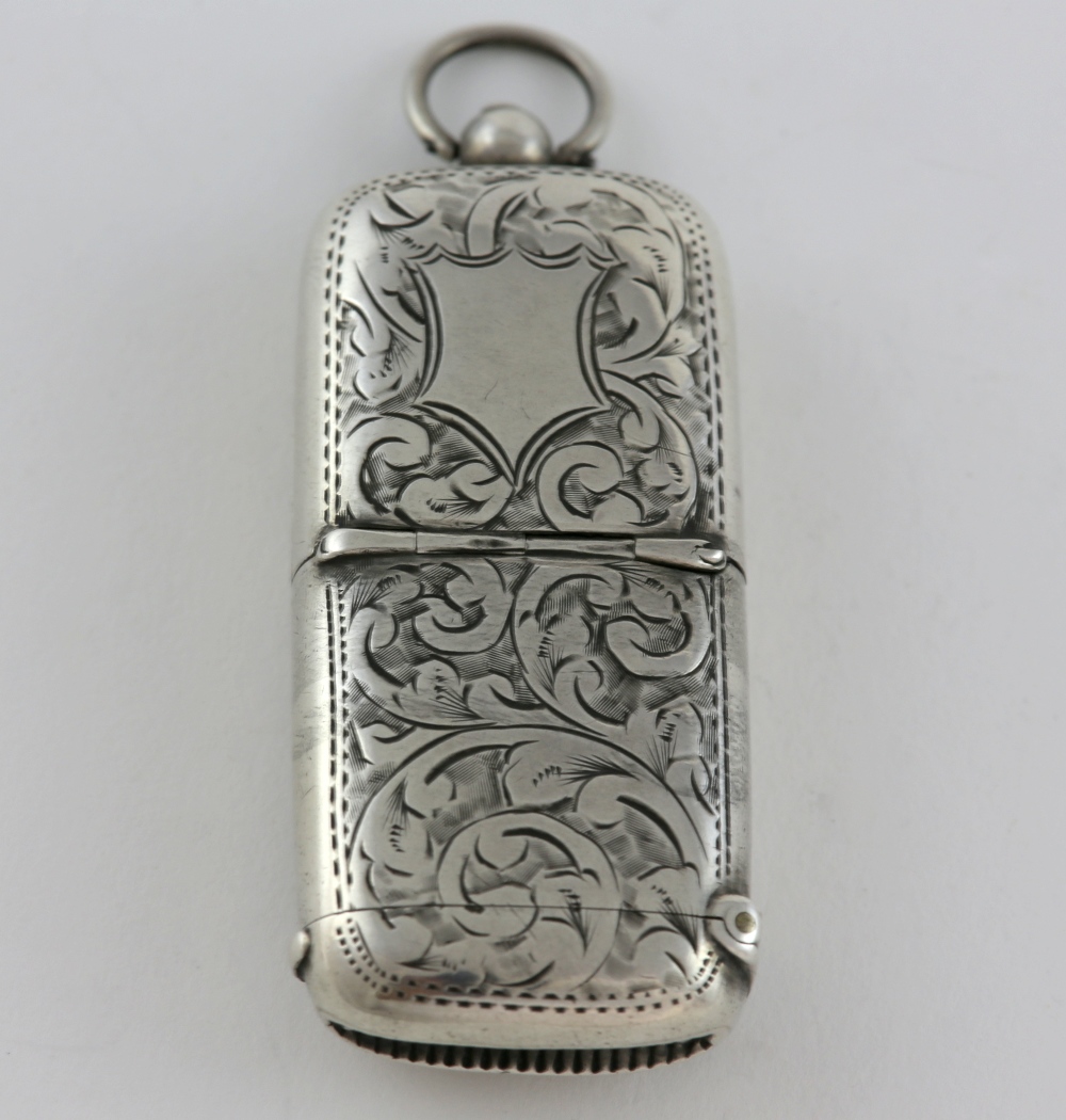 Victorian silver combination vesta and sovereign holder with engraved foliate decoration, by
