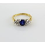 Sapphire and diamond dress ring, central oval cut sapphire, estimated weight 1.42 carats, set with