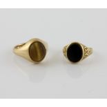Vintage oval cabochon cut tigers eye signet ring, mounted in 9 ct, size T and onyx signet ring,