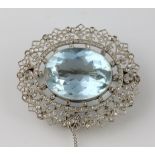 20th C aquamarine and diamond brooch, central oval cut aquamarine estimated weight 22.30 carats,