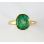 Modern emerald single stone ring, oval cut emerald, estimated weight 3.36 carats, bezel set in 9